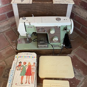 Vintage 1960s Dressmaker sewing machine in mint green