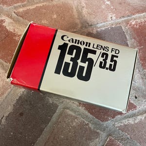 canon fd 135mm f3.5 lens mint condition
