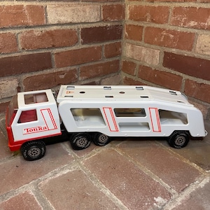Rare Vintage 1970s white and red press steel Tonka vehicle carrier