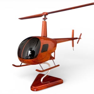 Maqueta de helicóptero R22 de caoba: arte artesanal para entrenamiento de aviación