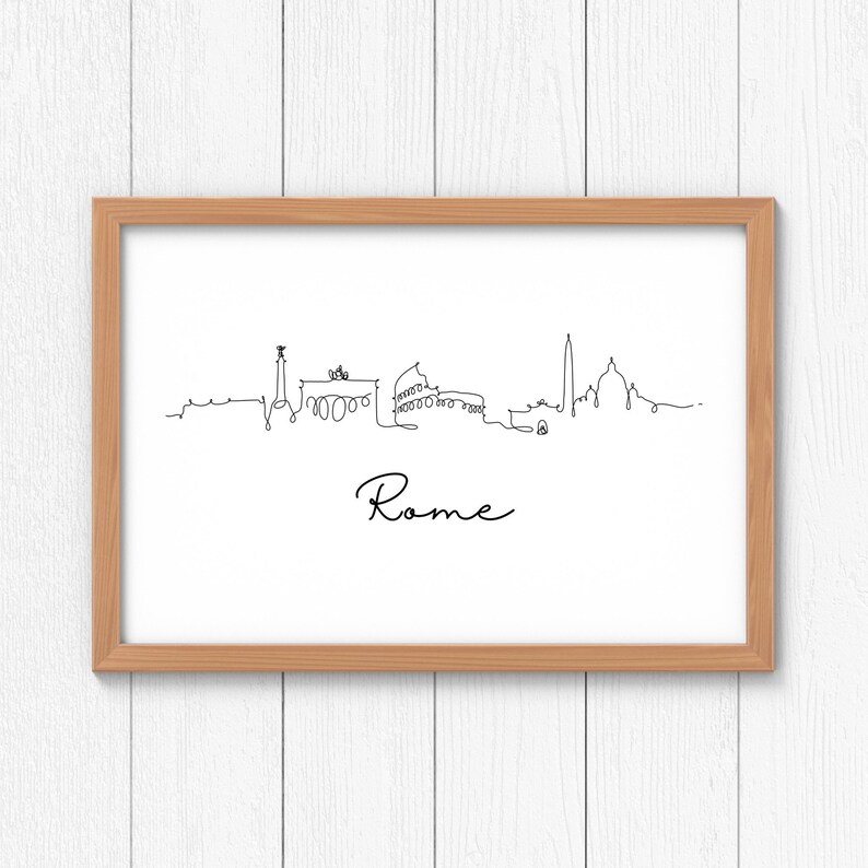 May include: A framed black and white line drawing of the Rome skyline with the word "Rome" written below the skyline.