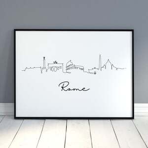 May include: Black and white line art print of the Rome skyline with the text "Rome" below the skyline.