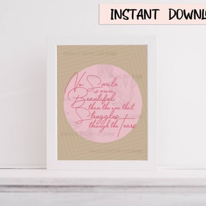 May include: A pink and white printable quote with the text "No smile is more beautiful than the one that struggles through the tears."