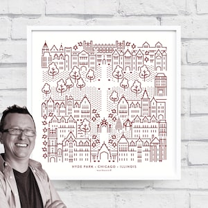 May include: A framed print featuring a minimalist line drawing of Hyde Park, Chicago, Illinois. The artwork is in shades of burgundy and white, depicting buildings, trees, and stars. The text "HYDE PARK • CHICAGO • ILLINOIS" is at the bottom.