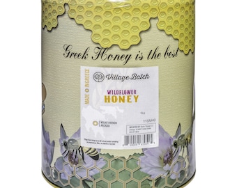 May include: A yellow and green metal can with a label that reads "Greek Honey is the best" and "Village Batch Wildflower Honey". The can is decorated with a bee and flowers. The can is 5 kg.