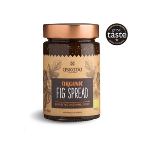 May include: A jar of organic fig spread with a bronze lid and a brown label. The label features the text "Organic Fig Spread" and "Handmade in Greece." A "Great Taste 2017" award seal is visible.