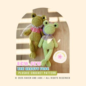 May include: Two crocheted green frog plushies with pink and purple accents. The plushies are sitting on a wooden surface. The text "LOW SEW THE GROOVY FROG PLUSHIE CROCHET PATTERN © 2025 RAVEN AND JADE / ALL RIGHTS RESERVED" is at the bottom of the image.