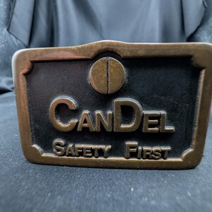 Vintage CanDel Safety First Brass Belt Buckle 1980