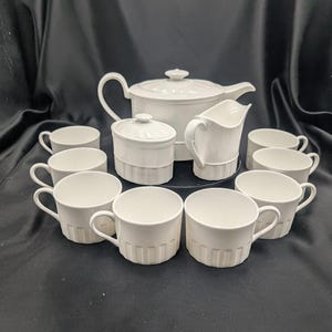 Wedgwood Colosseum Tea Pot Covered Sugar and Creamer and 8 Cups