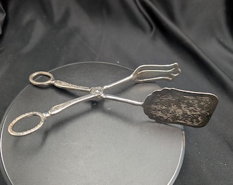 Vintage silverpläterade baktänger, utsmyckade blommiga graverade serveringsredskap