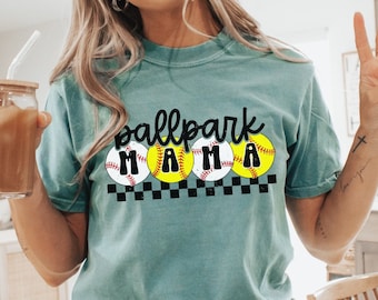 May include: A teal blue t-shirt with the text "ballpark mama" and a graphic of four baseballs with the letters "MAMA" on them. The baseballs are yellow with red stitching.