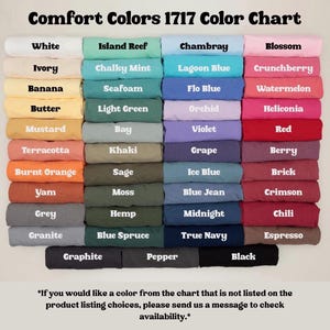 May include: Color chart featuring Comfort Colors 1717, showcasing a variety of hues. The chart displays colors like white, ivory, banana, mustard, terracotta, burnt orange, yam, grey, and granite. Additional colors include island reef, chambray, blossom, and more. Text at the bottom provides instructions.