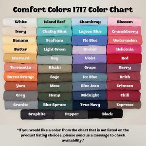 May include: A Comfort Colors 1717 color chart displaying a grid of folded t-shirts in various shades including white, ivory, banana, butter, mustard, terracotta, burnt orange, yam, grey, granite, island reef, chalky mint, seafoam, light green, bay, khaki, sage, moss, hemp, blue spruce, graphite, pepper, chambray, lagoon blue, flo blue, orchid, violet, grape, ice blue, blue jean, midnight, true navy, blossom, crunchberry, watermelon, heliconia, red, berry, brick, crimson, chili, espresso, and black.