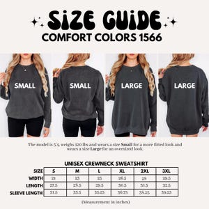 May include: Size guide for a unisex crewneck sweatshirt in Comfort Colors 1566. The image shows a model wearing a Small and Large size. Measurements in inches are provided for sizes S to 3XL, including width, length, and sleeve length.