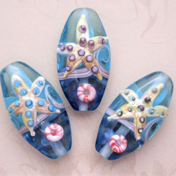 Starfish Glass Lampwork Oval Beads, Aqua & Indigo Blue, Cream Starfish with Green and Purple Dots in Handmade Ocean Life Beads (2 or 3)