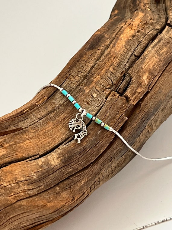 Vintage 1970s native Kokopelli and turquoise liqui