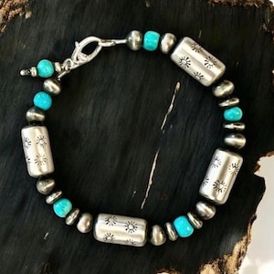 Navajo Pearl Bracelet. Turquoise, Navajo Pearl, and Shotgun Shell Barrel Bead Sterling Silver Native American Bracelet.