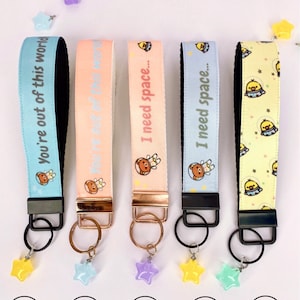 Heat pressed & custom fabrication kawaii inspired keychain wristlets