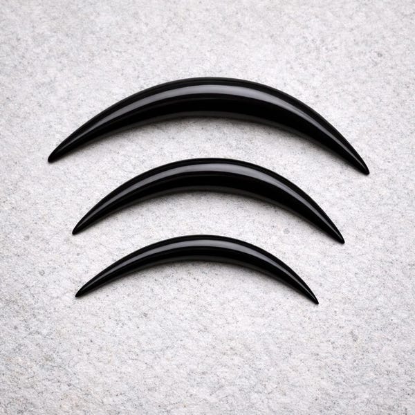 Black Buffalo Horn Curved Septum Tusk – Hand Carved Tribal Jewelry (Sold by Piece)