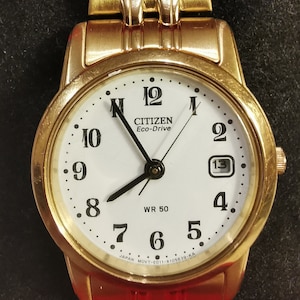 Citizen Eco-drive E011-S070996 Japan solar Ladies watch Golden plated Date
