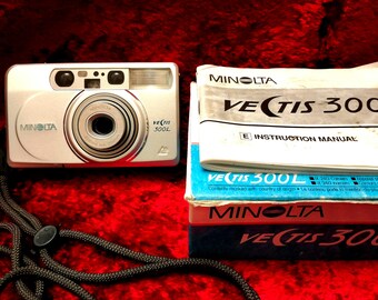 Minolta Vectis 300L APS Film Camera Compact Zoom 24-70mm Y2K Retro Minolta Vectis 300L APS Film Camera Compact Zoom 24-70mm Y2K Retro