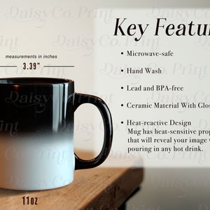 May include: A black and white colour-changing mug with a heat-sensitive design. The mug is 11oz and measures 3.39 inches in diameter and 6.77 inches in height. The mug is microwave-safe, hand wash only, lead and BPA-free, and made of ceramic with a glossy finish.