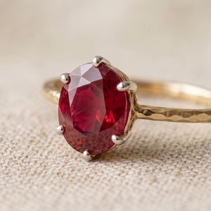 Natural Ruby Panchtatu Gold Plated Oval Cut Two Tone Six Prong Hammered Ring
