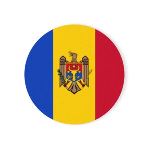 May include: A circular sticker featuring the national flag of Moldova, which consists of three vertical stripes in blue, yellow, and red. In the centre of the yellow stripe is the coat of arms, depicting an eagle holding a cross and a shield.