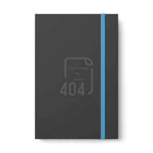 May include: A black notebook with a blue ribbon bookmark. The front cover has a gray graphic of a document with the text "motivation not found 404".