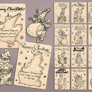 May include: Wooden Christmas ornaments and cards featuring Grinch-themed designs. The ornaments and cards have cut-out designs with text like "Merry Christmas" and "Season's Greetings." The illustrations are in black and white, with snowflakes and stars.