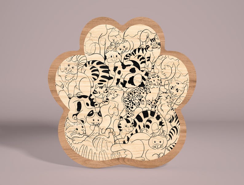 May include: A wooden paw-shaped plaque with a black and white line drawing of a group of cats. The cats are in various poses, some are curled up, some are sitting, and some are standing. The plaque is a light brown color and has a smooth finish.