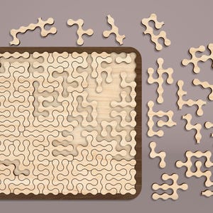 May include: A wooden jigsaw puzzle with a brown frame and a light brown background. The puzzle is made up of many small, interlocking pieces that are shaped like a series of connected circles. The puzzle is missing some pieces, which are scattered around the frame.