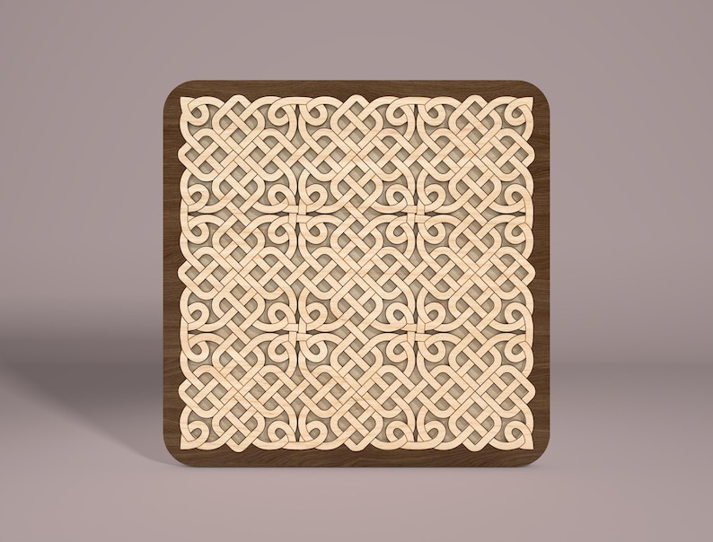 May include: A square wooden coaster with a Celtic knot design. The coaster is made of light brown wood with a dark brown border.