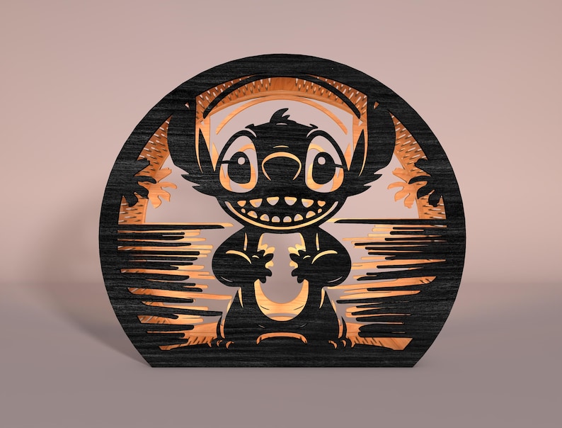 May include: A black and brown wooden layered art piece featuring the character Stitch from Lilo & Stitch. The artwork is in a circular frame with a tropical scene and Stitch's silhouette. The piece has a layered design with a light brown interior.