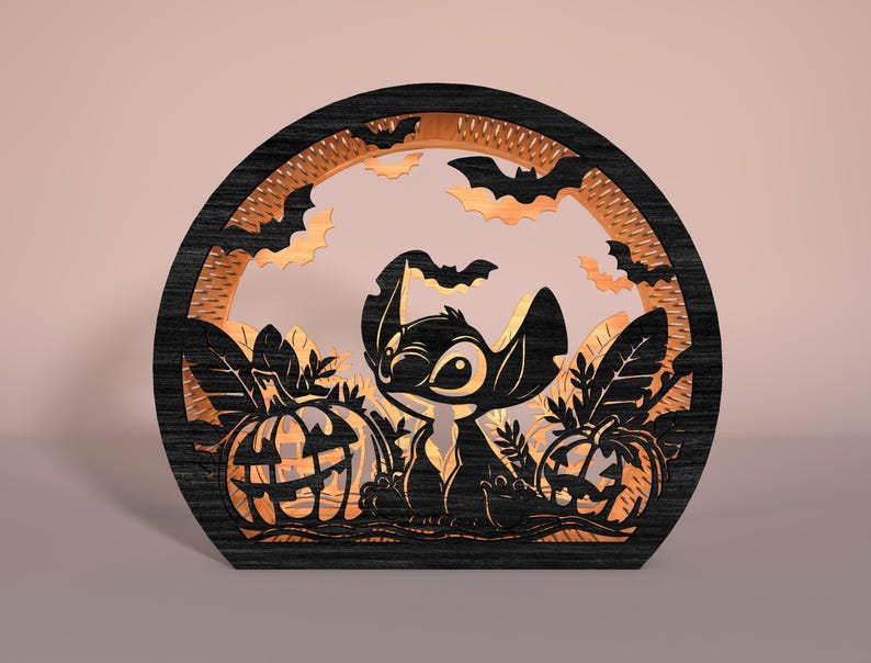 May include: A black wooden Halloween decoration featuring a cartoon character, pumpkins, and bats. The design is laser-cut with intricate details, creating a layered effect. The pumpkins have carved faces, and bats are silhouetted against a light background.
