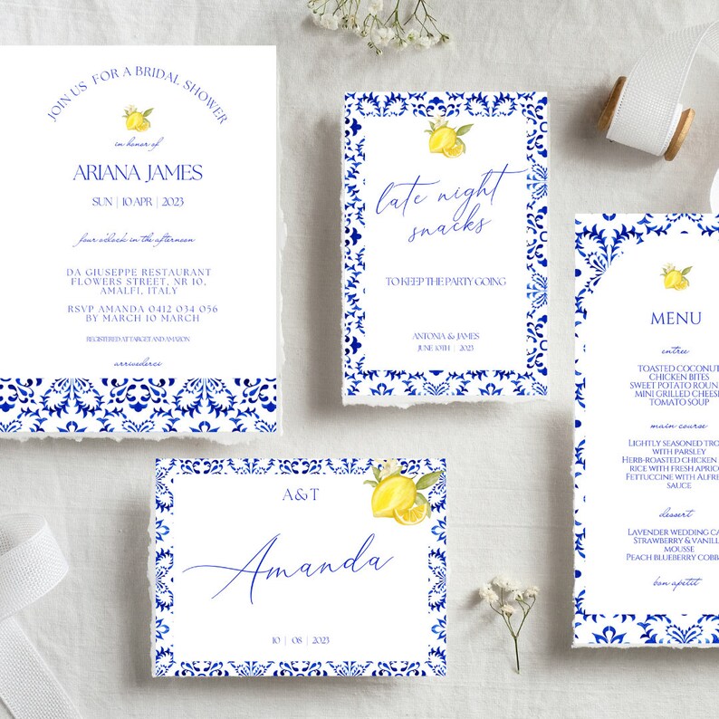 May include: Blue and white patterned wedding invitation suite with lemons and floral accents. The invitation includes a bridal shower invitation, a late night snacks card, a menu card, and a save the date card. The text on the cards reads "Join us for a bridal shower", "Late night snacks", "Menu", and "A&T Amanda".