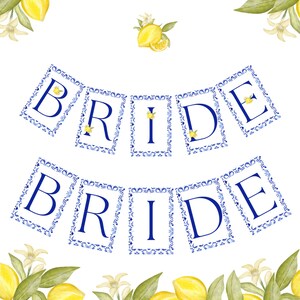 May include: A blue and white banner with the word "BRIDE" spelled out in white letters. The banner is decorated with a lemon and floral pattern.