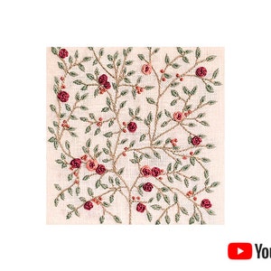 May include: Embroidered design of a floral pattern with pink and red roses on a white linen background.