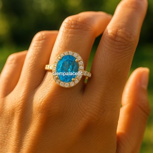 Anillo de compromiso con halo de topacio azul suizo: anillo de compromiso de oro de 14 k con doble diamante