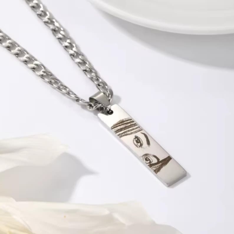 Engraved eye pendant necklace in various chain lengths (14"-22"), designed as a meaningful keepsake for couples, perfect as a personalized Christmas gift.