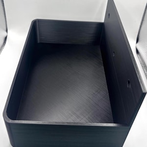 May include: A set of three ceramic mugs with a speckled, matte finish. Each mug features a different color: light blue, cream, and gray. The mugs have a simple, modern design and a comfortable handle.