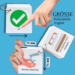 May include: A set of 7.5 cm by 7.5 cm flash cards with a green checkmark, a picture of hands washing, and a picture of a bed. The text on the cards reads "Ja", "H&auml;nde waschen", "GR&Ouml;SSE", "Konzeption", "tragbar", and "ich m&ouml;chte mich hinlegen".