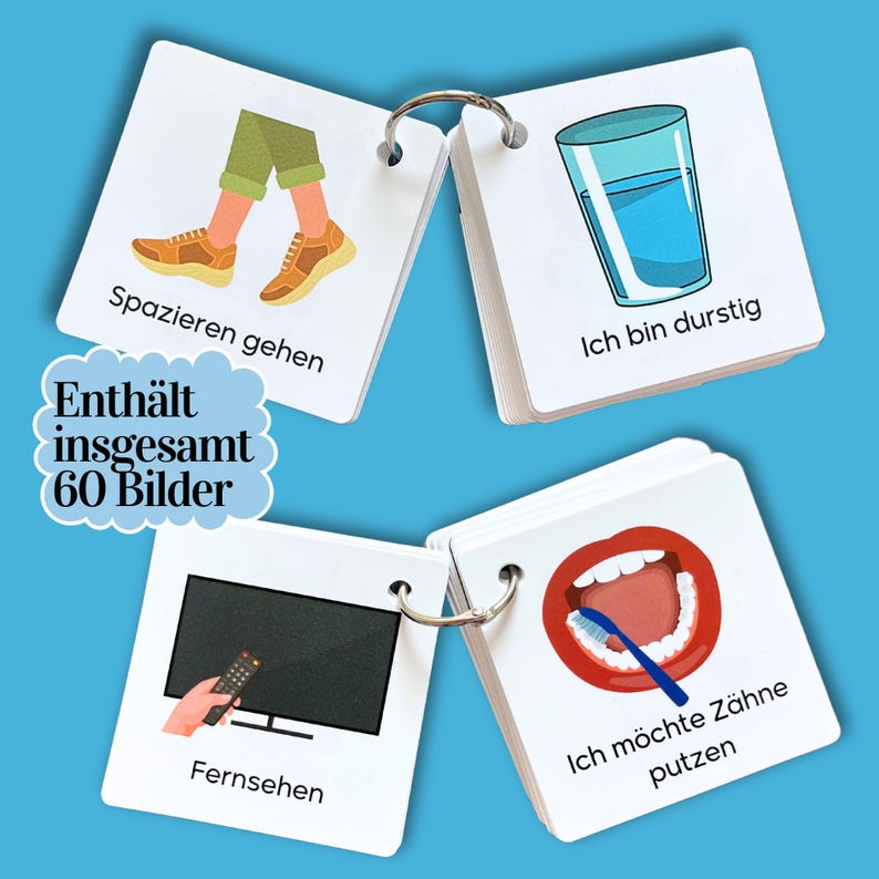 May include: A set of 60 picture cards with images and text in German. The cards are on a blue background. The cards show images of a person walking, a glass of water, a television, and a mouth brushing teeth. The text on the cards reads "Spazieren gehen", "Ich bin durstig", "Fernsehen", and "Ich m&ouml;chte Z&auml;hne putzen".