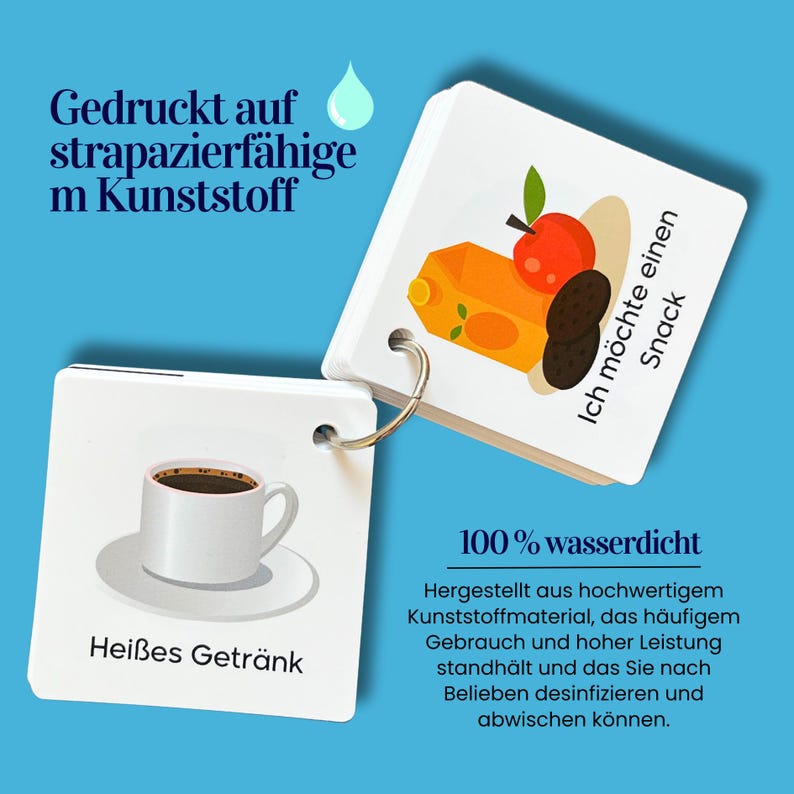 May include: A set of waterproof flashcards with colourful illustrations and German text. The cards are designed for learning about different foods and drinks. The text on the cards includes "Hei&szlig;es Getr&auml;nk" (hot drink), "Ich m&ouml;chte einen Snack" (I want a snack), and "100% wasserdicht" (100% waterproof).
