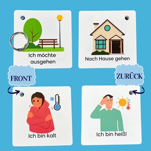 May include: Four white cards with illustrations and German text. The top left card shows a park scene with a bench and a lamppost. The text reads "Ich m&ouml;chte ausgehen". The top right card shows a house with a door and windows. The text reads "Nach Hause gehen". The bottom left card shows a person wearing a pink jacket and shivering. The text reads "Ich bin kalt". The bottom right card shows a person with a red face and a thermometer. The text reads "Ich bin hei&szlig;!"