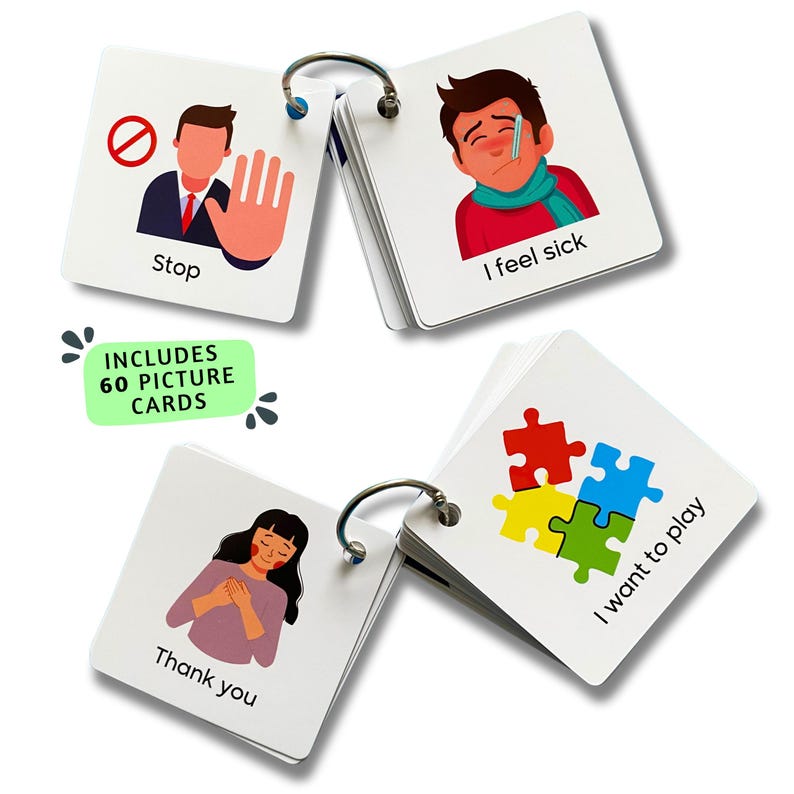 May include: A set of 60 picture cards with a ring binder. The cards feature various images and phrases, including "Stop", "I feel sick", "I want to play", and "Thank you".