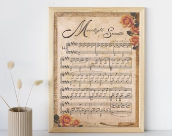 May include: A framed print of a vintage sheet music score for the Moonlight Sonata by Ludwig van Beethoven. The sheet music is printed on aged paper with a faded brown background. The title "Moonlight Sonata" is written in elegant cursive script. The sheet music is decorated with a cluster of orange roses in the upper right corner.