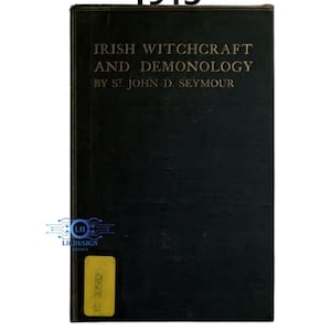May include: A vintage book titled "Irish Witchcraft and Demonology" by St. John D. Seymour. The cover is black with gold lettering and the year "1913" at the top. A yellow sticker with text is on the bottom.