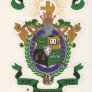 May include: A Lambda Chi Alpha Fraternity sticker with a crest design. The crest features a shield with various symbols, a banner with the text "PER CRUCEM CRESCENS", and the letters "ΛΧΑ" in gold and purple.