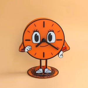 Pode incluir: Relógio laranja com uma face e braços, em pé sobre uma base redonda com o texto "Time Waits For All Time - Always".